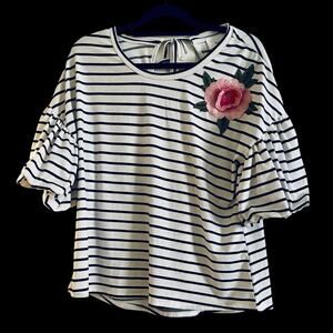 Elegant Striped Blouse with Floral Accent